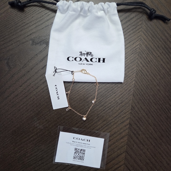 Coach Jewelry - Coach Gold Charm Bracelet New With Dusty